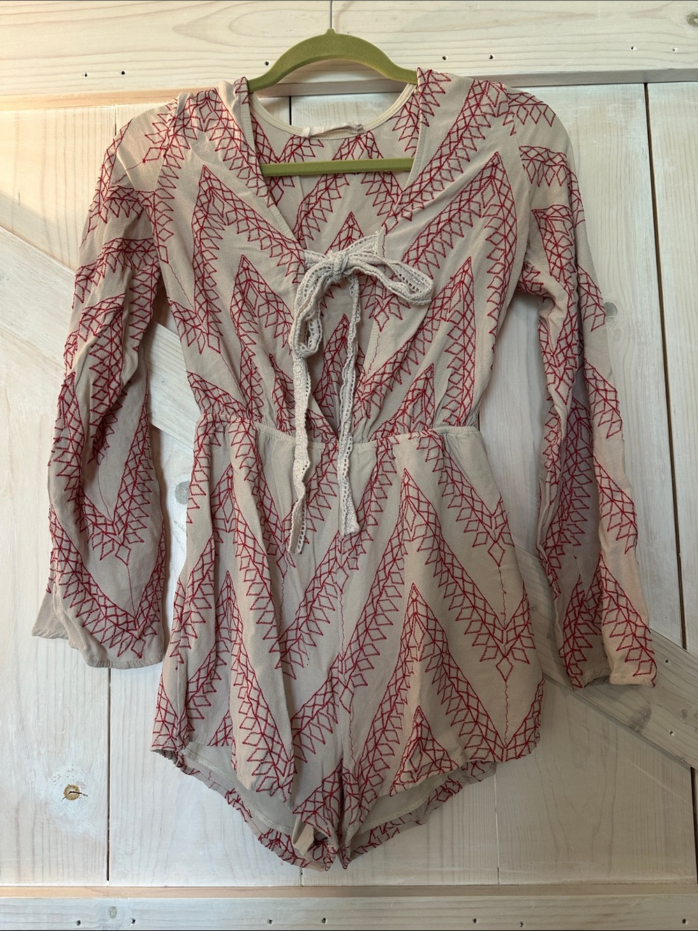 Long sleeve embroidered romper size small